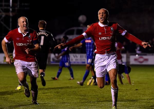 Salford City's Richie Allen celebrates scoring against Notts County in the FA Cup first-round upset