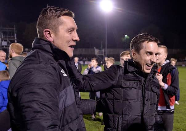 Salford City's co-manager Anthony Johnson and co-owner Gary Neville (right)