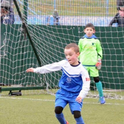Robert in action in his first game back for Waldridge Park Under-8s.