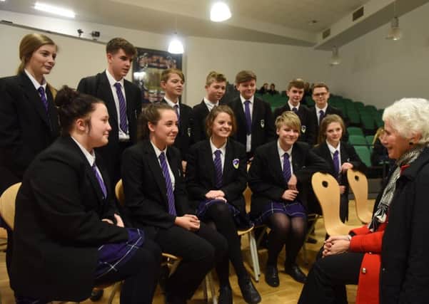 Holocaust survivor Eva Clarke talking to pupils at Castle View Academy, Sunderland.