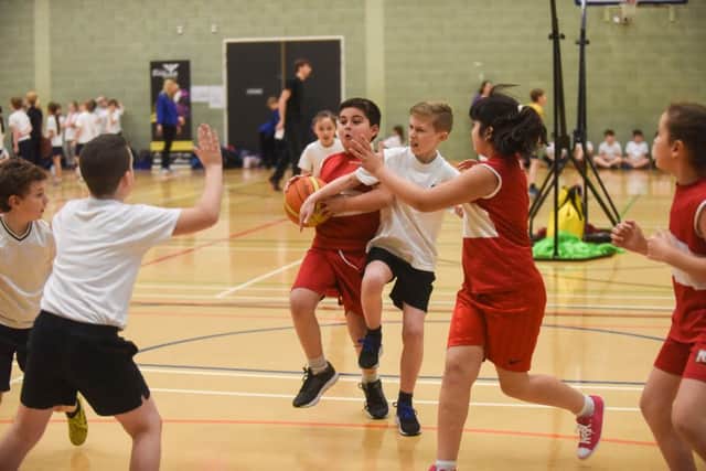Sunderland schools taking part in a basketball event at City Space, Edinburgh Building, Chester Road, Sunderland on Wednesday. Match between Mill Hill Praimary (white) and Richard Avenue Primary (red/white).
