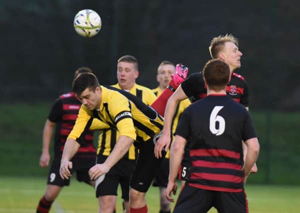 Durham City Reserves (red/black) take on Seaham New Westlea two weeks ago