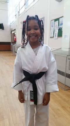 Safiyyah Mae Touray, a member of West Community Centre Karate Club, Chester Road, has passed her 1st Dan Black Belt.