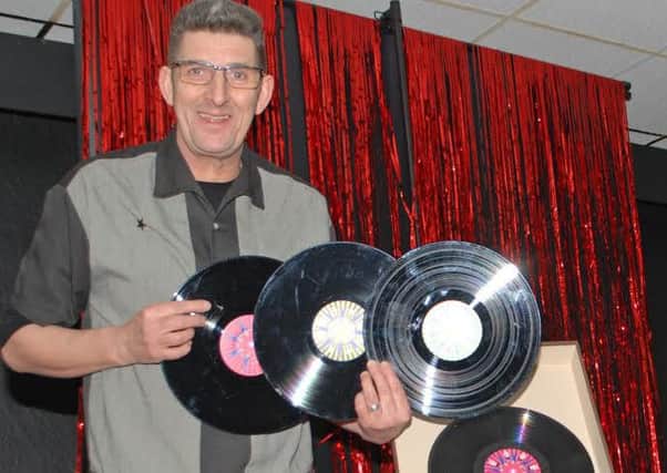 Steve Drayton with some of the jukebox records.