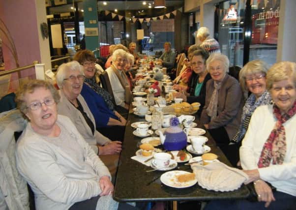 Members of Tavistock and Broadway Grindon TGs enjoying afternoon tea at Crumb On In.
