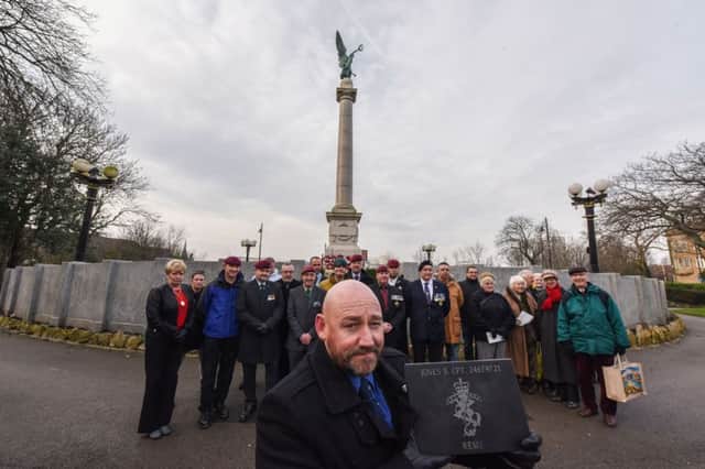 Launch of a Veterans' Walk in Mowbray Park, with Tom Cuthbertson pictured with one of the granite stones for the walk, other veterans and familes and Friends of Mowbray Park.