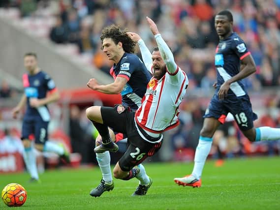 Steven Fletcher is fouled by Fabricio Coloccini in the first derby of the season.