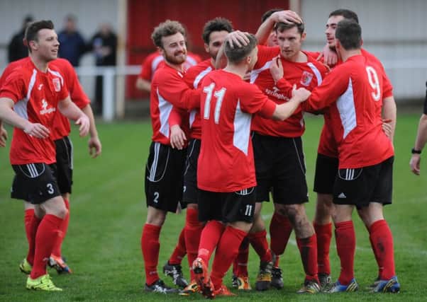 Liam Hatch gets congratulated on his goal in Sunderland RCA's win over Sleaford. Picture by Tim Richardson