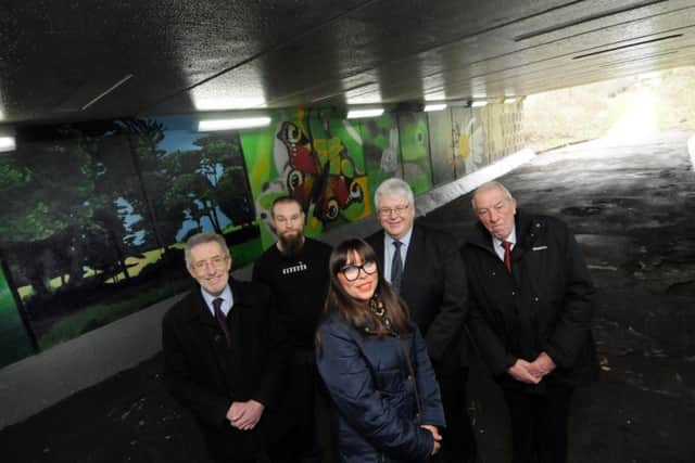 Newly decorated subway at Barnes Subway, Hisburn Drive by local artist Frank Styles
From left Coun's Ian Galbraith, local artist Frank Styles, Rebbecca Atkinson, Michael Essl and Peter Gibson