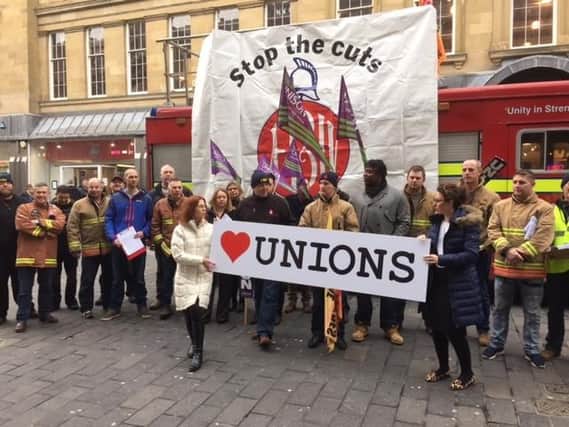 Members of the FBU protest against public sector spending cuts
