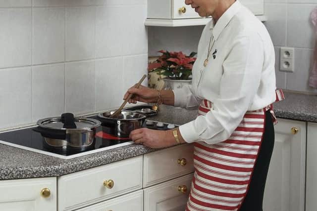 A Generic photo of of a mature  woman cooking a hot meal. See PA Feature CONSUMER Elderly Heating. PA Photo/JupiterImages Corporation. WARNING: This picture must only be used to accompany PA Feature CONSUMER Elderly Heating