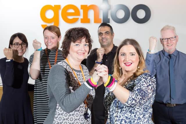 Andrea Loraine-Maughan, left, and wellbeing manager Michelle Haste with staff at Gentoo.