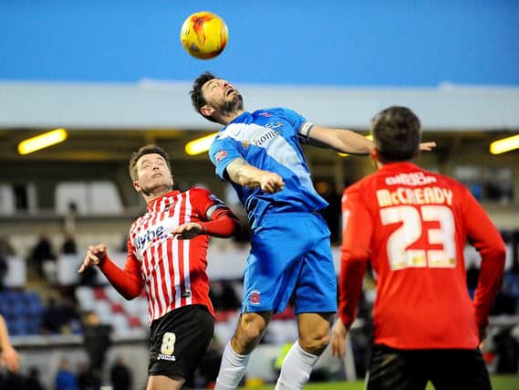 Billy Paynter gets up for a header for Pools: Picture by FRANK REID