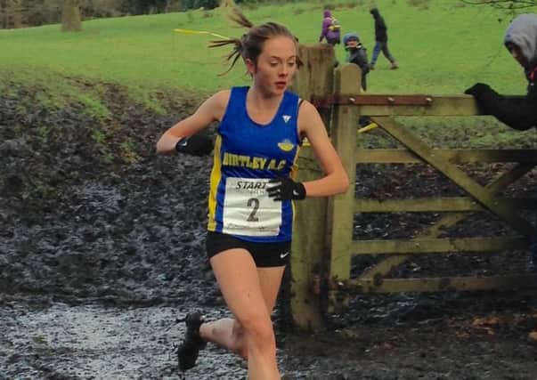 Sophie Burnett powers through the mud