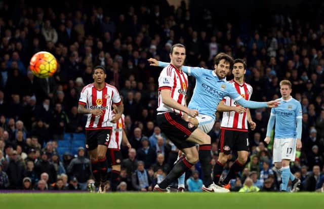 Manchester City's David Silva fires in a shot against Sunderland.