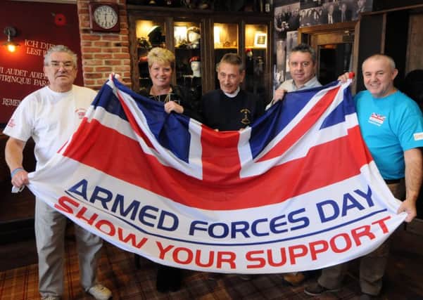 Ready to mark Armed Forces Day are Tom Hudson, Janice Proctor, Doug Bryant, Alex Bonallie and Paul Jasper.
