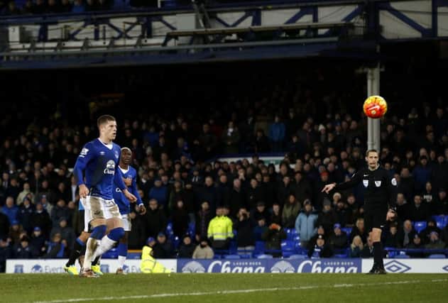 Ross Barkley dinks home his penalty for 3-0 after the dismissal of Jamaal Lascelles in conceding the spot-kick