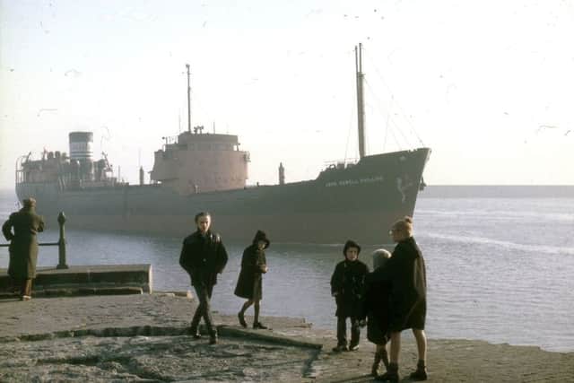 Duffel coats, donkey jackets, a flat cap and the John Orwell Phillips - an oil-fired collier built in the 1950s by Pickersgills for North Thames Gas.