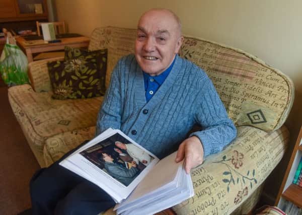 Norman Imms, of Scafell Close, Peterlee, with his book about Mother Theresa, that he hopes to have published.