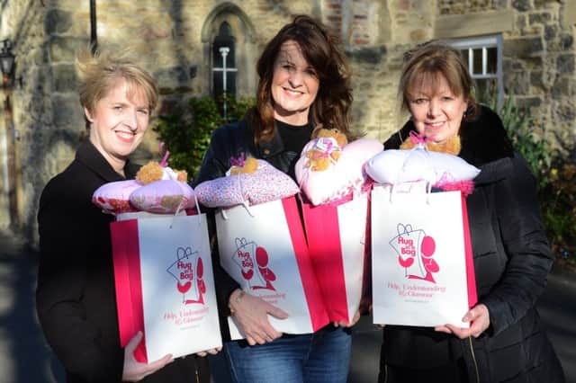 Breast cancer's Hug in a Bag,
From left Judith Wright, Sue McCoy and Eileen Richardson