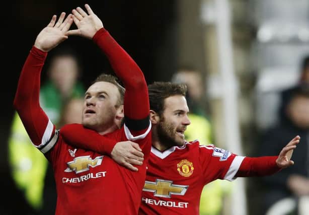 Wayne Rooney and Juan Mata