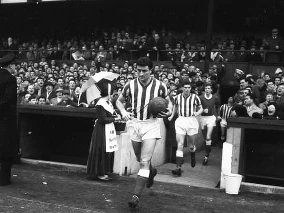 Charlie Hurley leading the Black Cats onto the pitch.