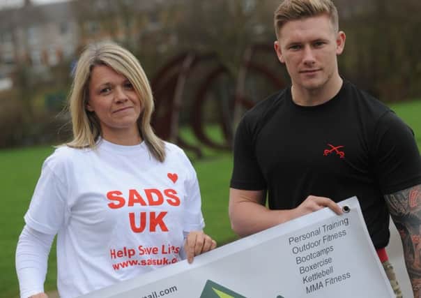 Battle Fit's Tony Waters and charity bootcamper Elaine Brown, who raised money for SADS UK.
