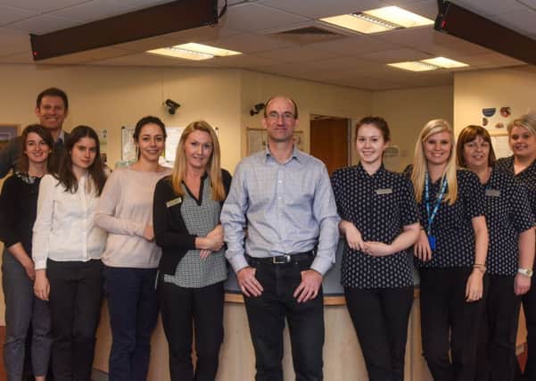 Dr Keith Burrell (centre) with the staff at Herrington Medical Centre, Philadelphia Lane, West Herrington, who have been nominated for a Sunderland Echo Health Award.