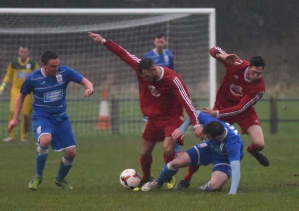 Washington (red) take on Seaham Red Star in Division One.  Picture by Kevin Brady