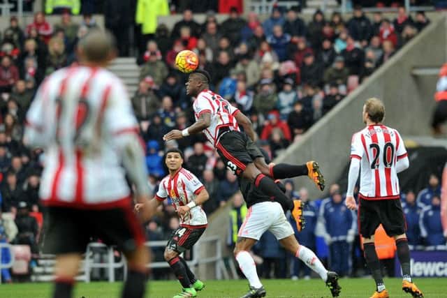 Lamine Kone wins a towering header for Sunderland