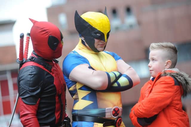 Empire Cinema's first Minicon to coincide with the launch of Deadpool - Karl Hicks as Deadpool and David Golden as Wolverine, meeting youngster Callum Barker.