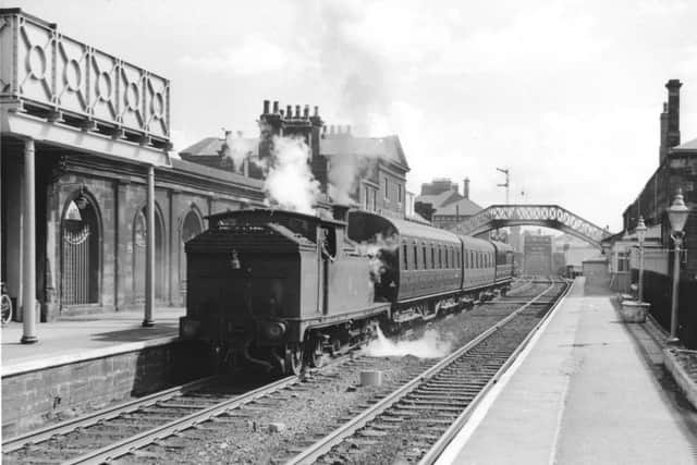 Photograph by Ian S Carr showing G5 0-4-4T No 67927, propelling a South Shields to Sunderland push and pull train, at Monkwearmouth Station in the late 1950s.