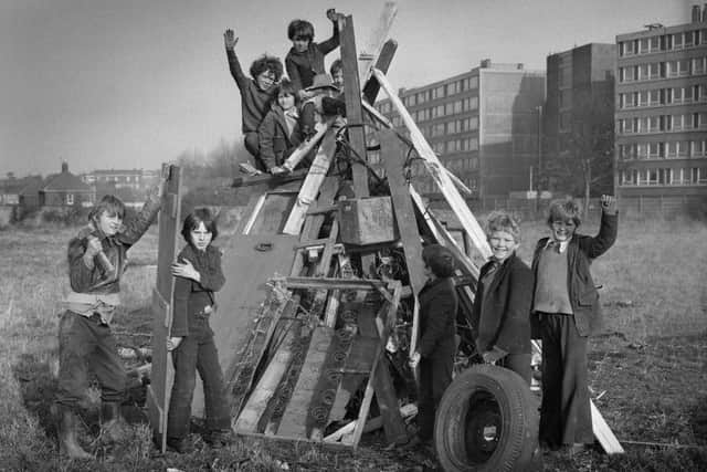 Blocks of modern flats can be seen behind the bonfire built by Southwick kids in 1974.