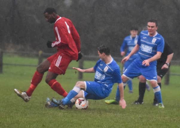Seaham Red Star (blue) defend against Washington in last week's First Division away win