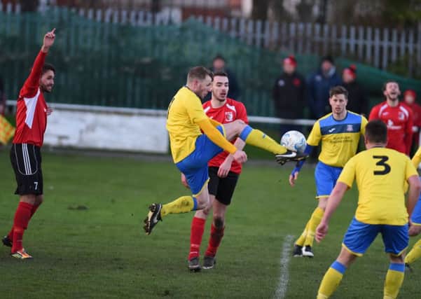 Bristol Manor Farm (yellow) take on Sunderland RCA in the last round of the FA Vase