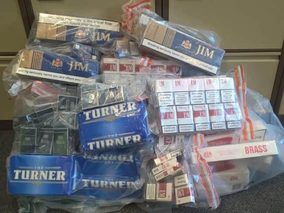 A huge haul of counterfeit cigarettes and tobacco was uncovered in a joint swoop by police and council officers.