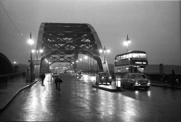Wearmouth Bridge all lit up with Victorian-style lamps in the early 1950s.