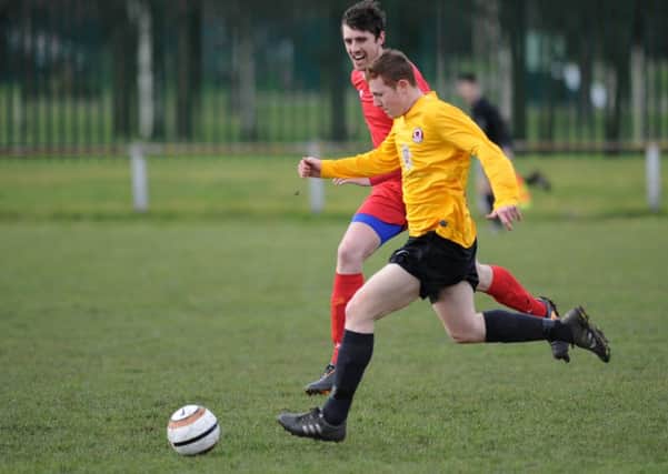 Wearside Football League action between Murton (red) and Sunderland West End last week. Picture by Tim Richardson