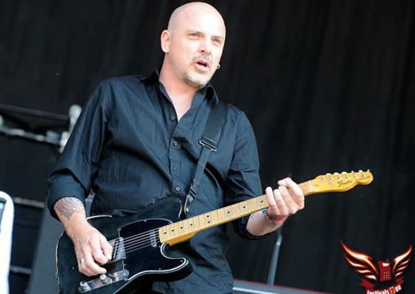 Baz Warne performing with The Stranglers at Glastonbury in 2010.