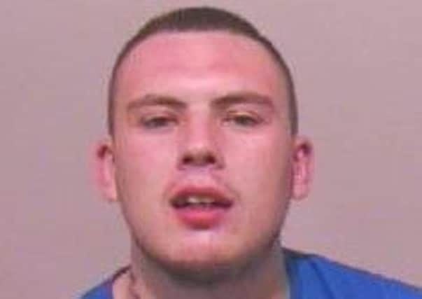 Adam English was jailed for five years for robbing a taxi driver.