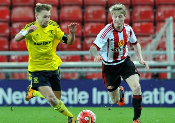 Harry Chapman (left) in action for Boro at Sunderland