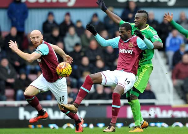 Dame N'Doye battles against West Ham sub Pedro Obiang on Saturday. Picture by Frank Reid