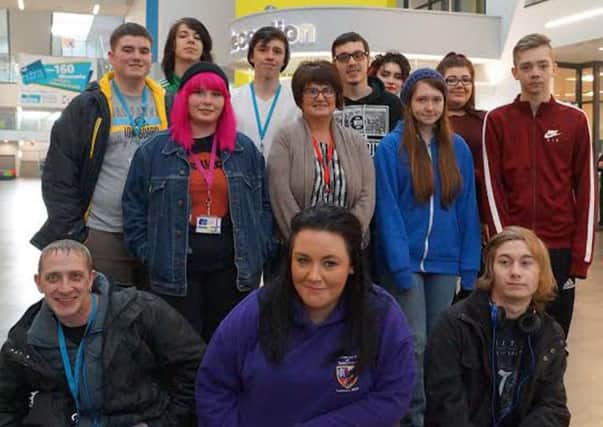 East Durham College creative industries students with Hartlepool Hospice community fundraiser Janice Forbes, centre standing.  The students are planning a fund raising event in aid of the hospice.