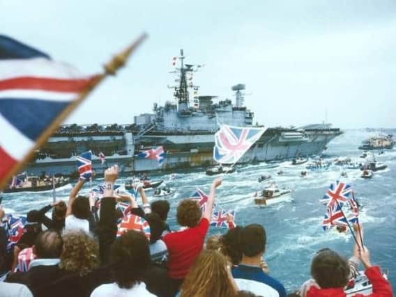 HMS Hermes on its return from the Falklands War.
