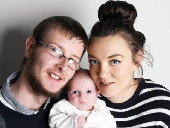 Shane Dowson and his girlfriend Deone Sully, aged 21, and their son, three-month-old Kian.