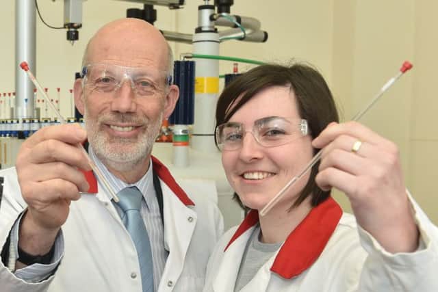Justice Minister David Ford with PhD student Louise Jones. Pic: Simon Graham/Harrison Photography.