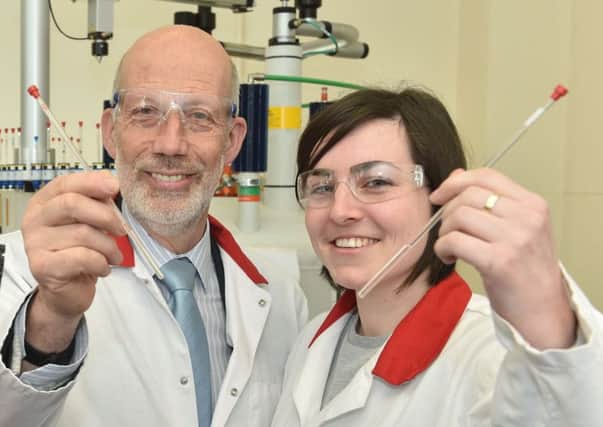 Justice Minister David Ford with PhD student Louise Jones. Pic: Simon Graham/Harrison Photography.