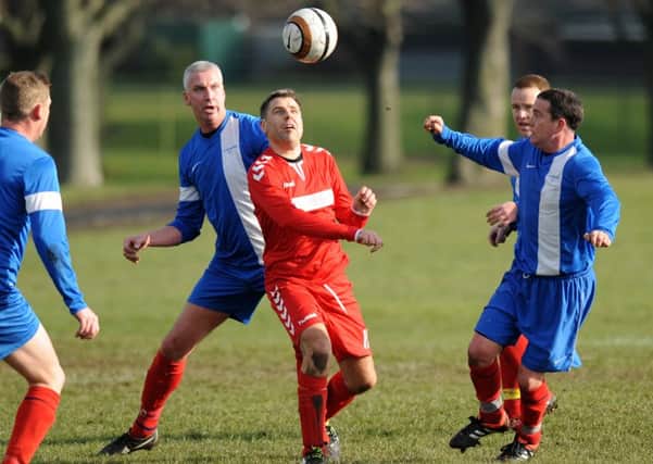 Over 40's football action between Wearmouth CW (red) v Hartlepool Touchdown. Picture by Tim Richardson