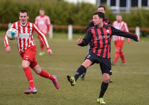 Seaham Red Star Reserves (red/white) take on Ashbrooke Belford House (last week. Picture by Kevin Brady