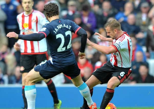 Newcastle's Daryl Janmaat and Sunderland's Lee Cattermole